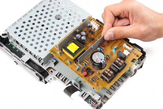 Guide photos remplacement logement / port d'extension Playstation 2 Fat (Etape 9 - image 2)